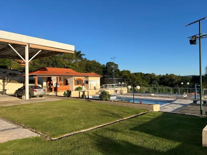 Residência Imponente em Terreno de 8.000 m² com Lazer Completo e Cenário Exclusivo