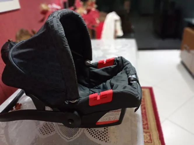 Bebê conforto touring burigotto