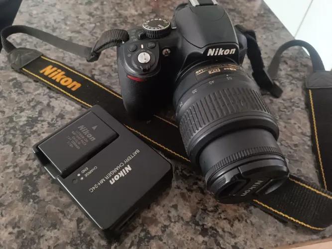 Câmera Nikon (leia o anúncio)
