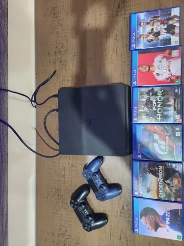 Playstation 4 Slim + 2 controles + 6 jogos