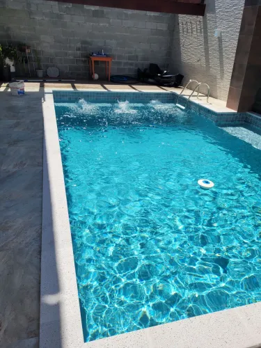 Manutenção de piscina, troca da areia do filtro e instalação de motor.