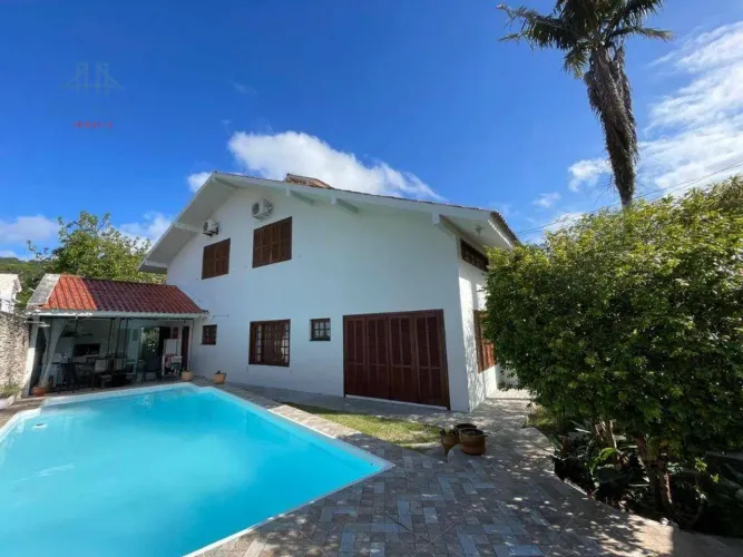 Casa com 3 dormitórios para alugar, 440 m² por R$ 14.625,00/mês - Córrego Grande - Florian