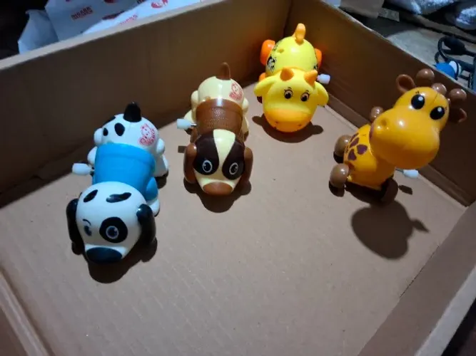 Brinquedo infantil de corda animais
