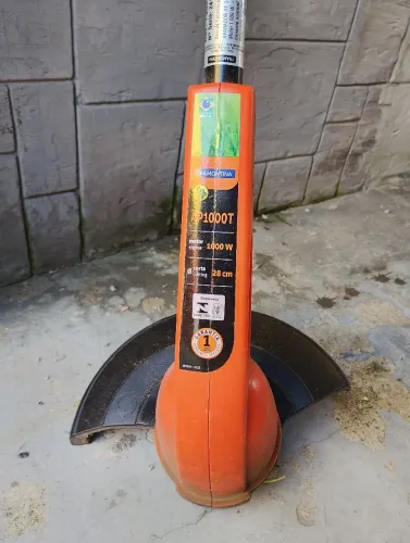 Máquina de cortar grama