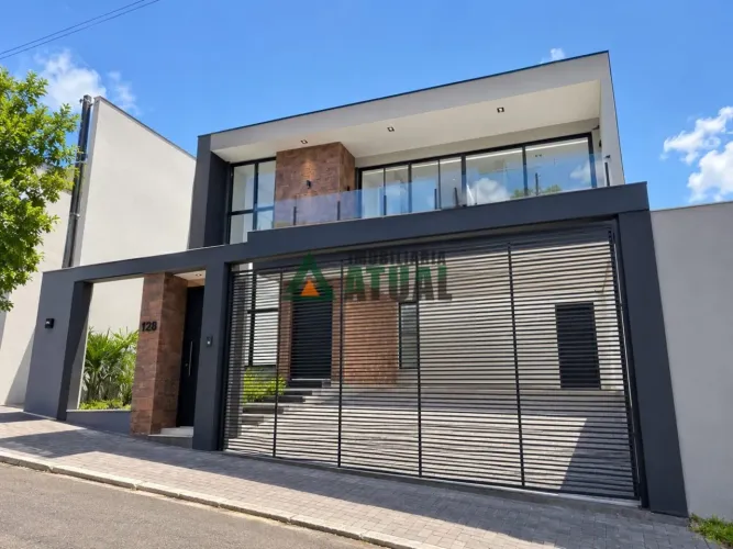 SOBRADO COM 3 QUARTOS SENDO DUAS SUÍTES A VENDA EM CAMBÉ.