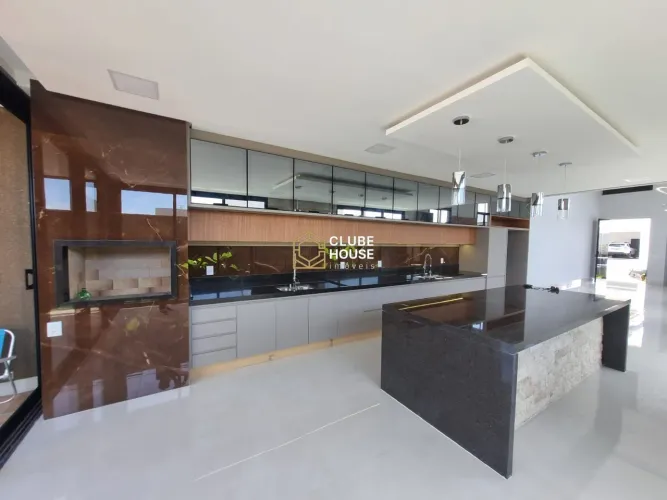 Casa com 4 suítes e móveis planejados à venda por R$ 2.390.000 - Condomínio Resi