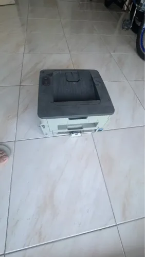 Impressora laser com defeito de fonte.
