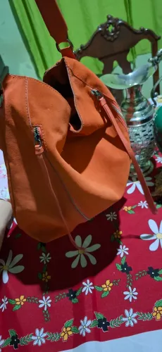 Relicário original bolsa animale de couro 