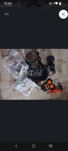 Cinto tipo paraquedista um trava queda e um talabarte de posicionamento