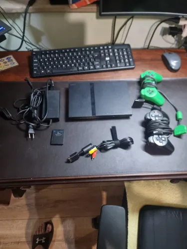 Playstation 2 controles e jogos.