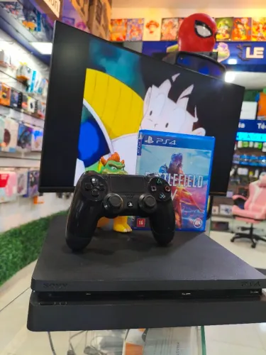 PlayStation 4 Slim + 1 Controle + 1 Jogo + 1 Ano Garantia - Loja Física