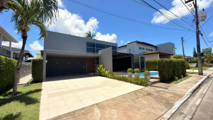Casa em condomínio fechado com 4 suítes + espaço gourmet com muito espaço