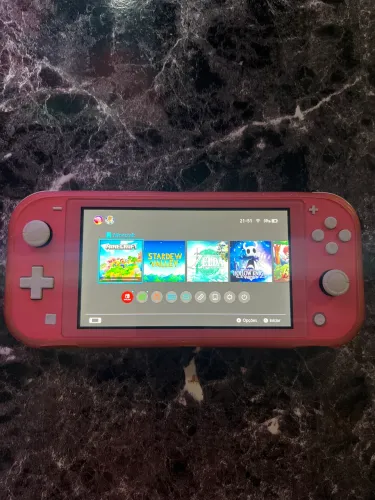 Nintendo Switch Lite + Case LEIA O ANÚNCIO.