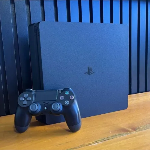 Playstation 4 slim com caixa 1 terá de memória impecável