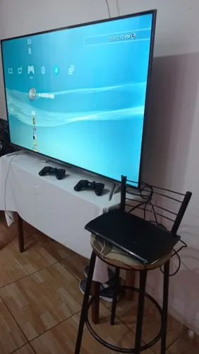 PS3 Super Slim Desbloqueado com 2 Controles Super Conservado