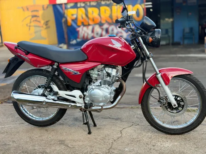 Honda titan 150 2006  partida Ipva pago