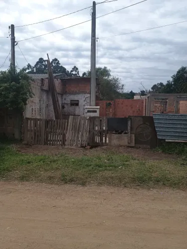 Terreno de barbada com casa inacabada contrato de compra venda aceito carro no negócio 