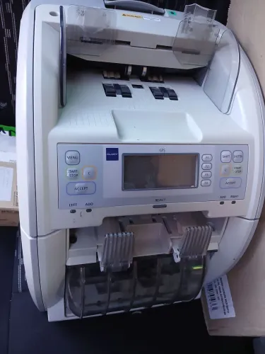 Máquina De contar dinheiro.