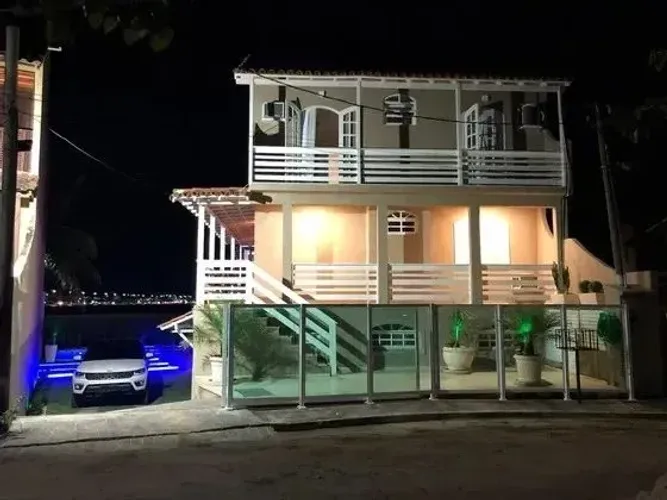 Casa de condomínio para aluguel por temporada possui 250 metros quadrados com 7 quartos