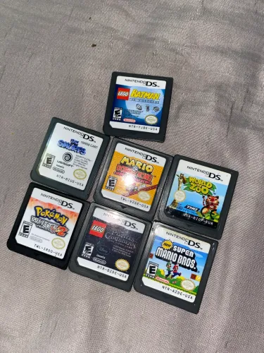 Jogos para Nitendo Dsi, smurfs, world zoo, piratas do Caribe, batman 