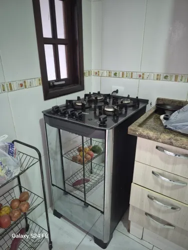 Vendo fogão Dako 5 bocas, com tampa de vidro, usado e muito bem conservado.