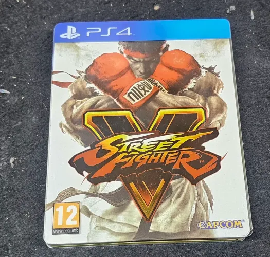 Street fighter V 5 Stellbook com jogo . Nova ps4