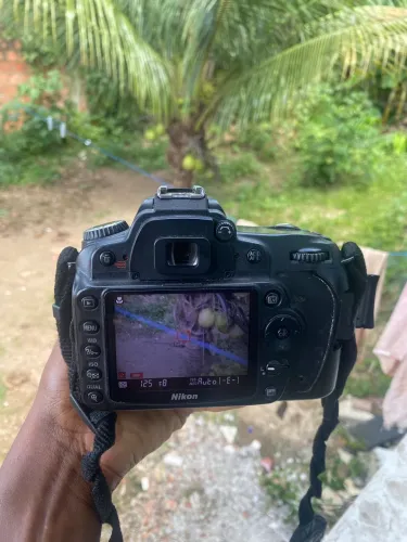 Câmera Nikon D90+lente 18-105