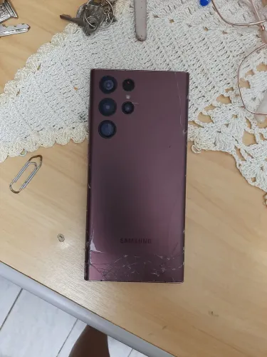 Celular S22 ultra defeito na placa liga desliga tela linha verde mas funciona p