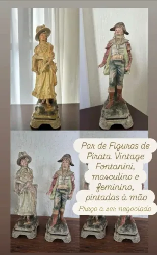 Par de esculturas.