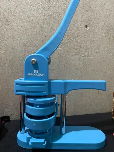 Máquina de bottons