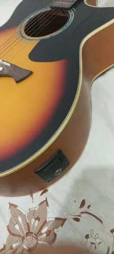Violão novo, nunca usado