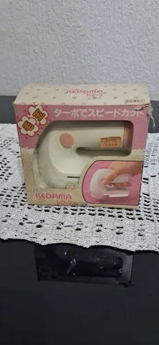 Máquina japonesa de tirar bolinha de roupa.