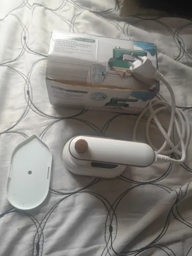Mini ferro de passar roupa