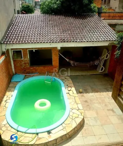 Casa com piscina 3 dormitórios e 2 Costa e Silva Zona Norte de Porto Alegre