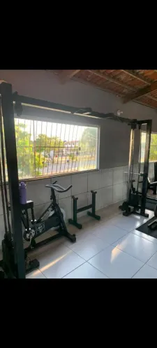 Cross over com bateria de 50kg de cada lado 