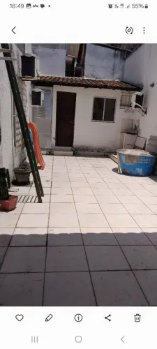 Loja de frente com Casa ou Clínica ou Laboratório nos fundos.