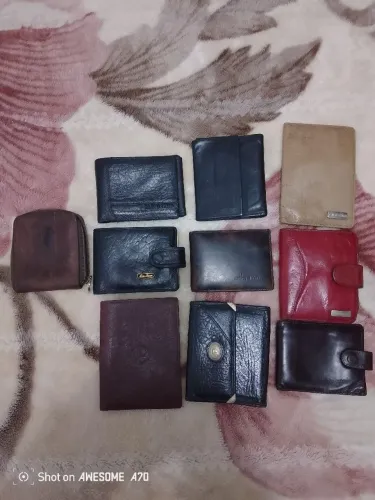 Lote de carteiras de couro, uma couro de cabra