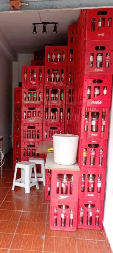 Coca cola garrafas e caixas 