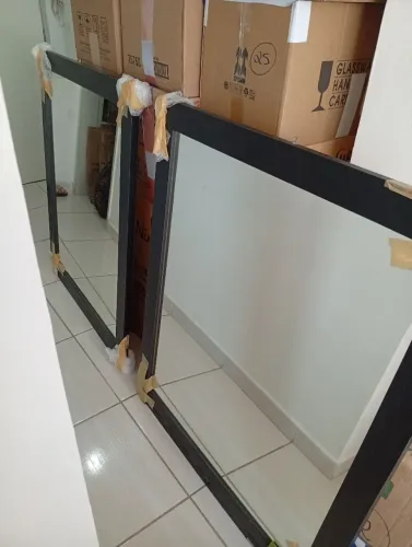 2 espelhos grandes, 1 m x 80 cm , cada um custa 900 reais