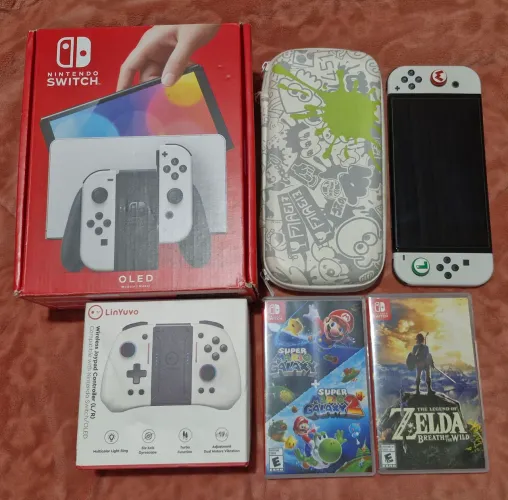Nintendo switch Oled com jogos na caixa