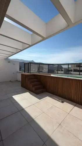 A Cobertura Duplex 2 quartos suíte vista pedra da gávea e lagoa que  transforma o seu esti