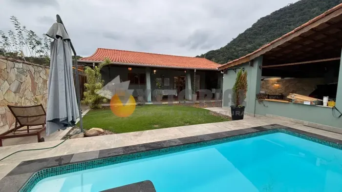 Casa com 4 dormitórios à venda, 255 m² por R$ 1.750.000 - Sumaré - Caraguatatuba/SP