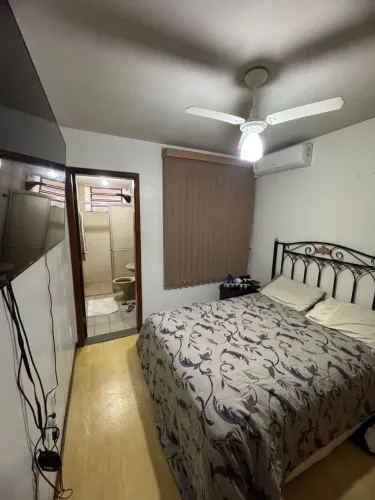 Cama de casal com cabeceira de ferro