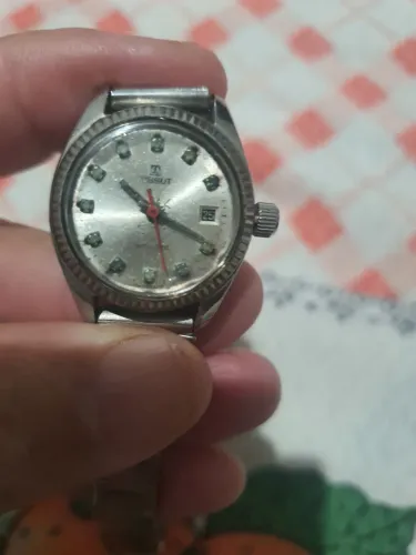 Tissot feminino funcionando normalmente todo em aço inox