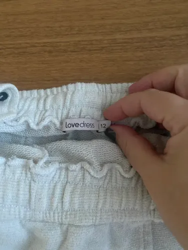 Macaquinho white off com brilho love dress to 12 anos
