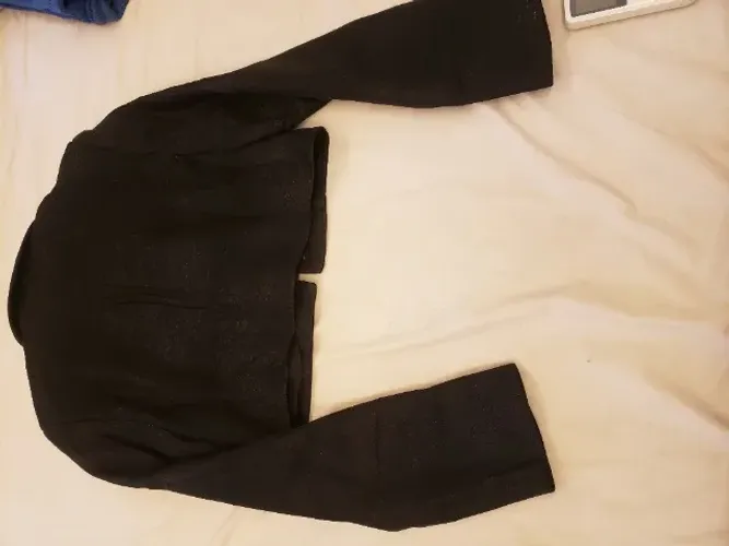 Casaquinho curto forrado ,veste P. Tecido leve e c pouco brilho