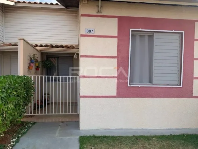 Casa à venda em Condomínio Moradas 2, São Carlos: 2 quartos, suíte, armários e 2 vagas