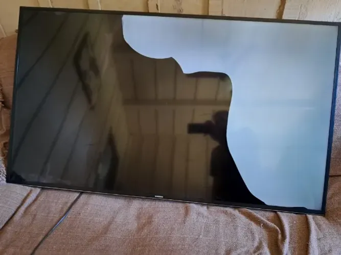 Tv Samsung un55mu6100g TELA QUEBRADA