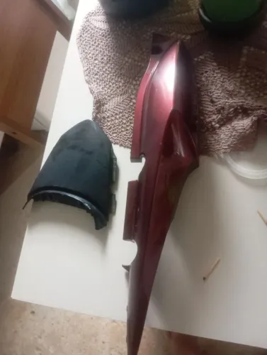 Pra vende essa tampa do fundo do lad direito da 150 Titan ou fan