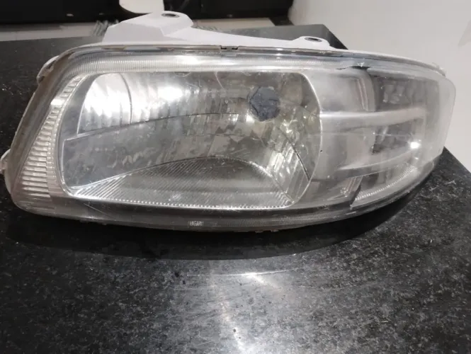 Farol esquerdo gol G4 arteb original 